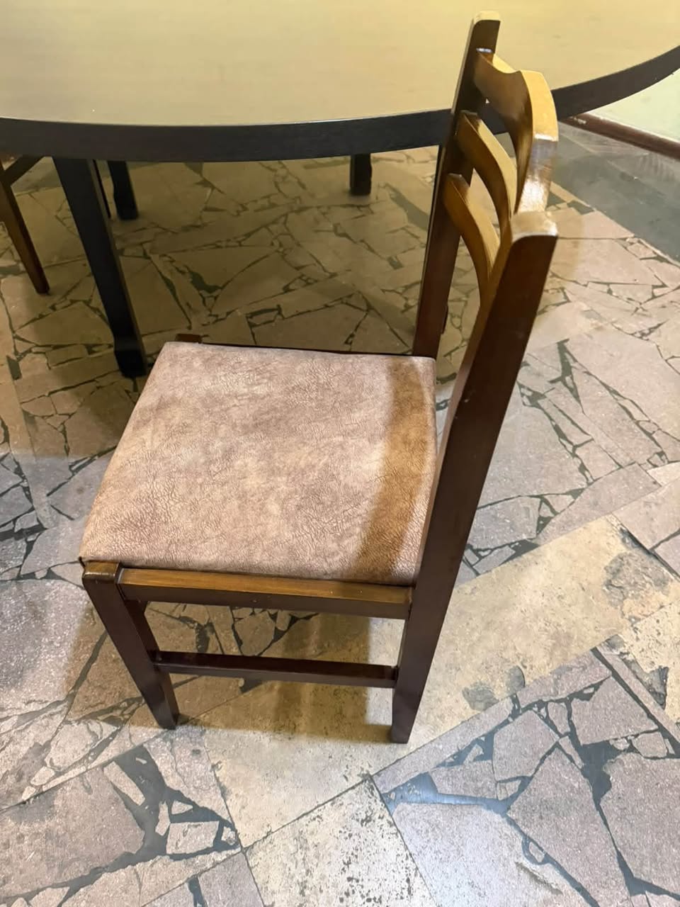 Wooden chair with upholstered seat
