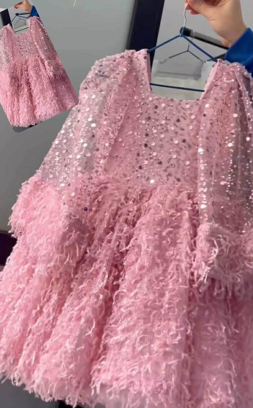 Children's party dresses are sold at prices and