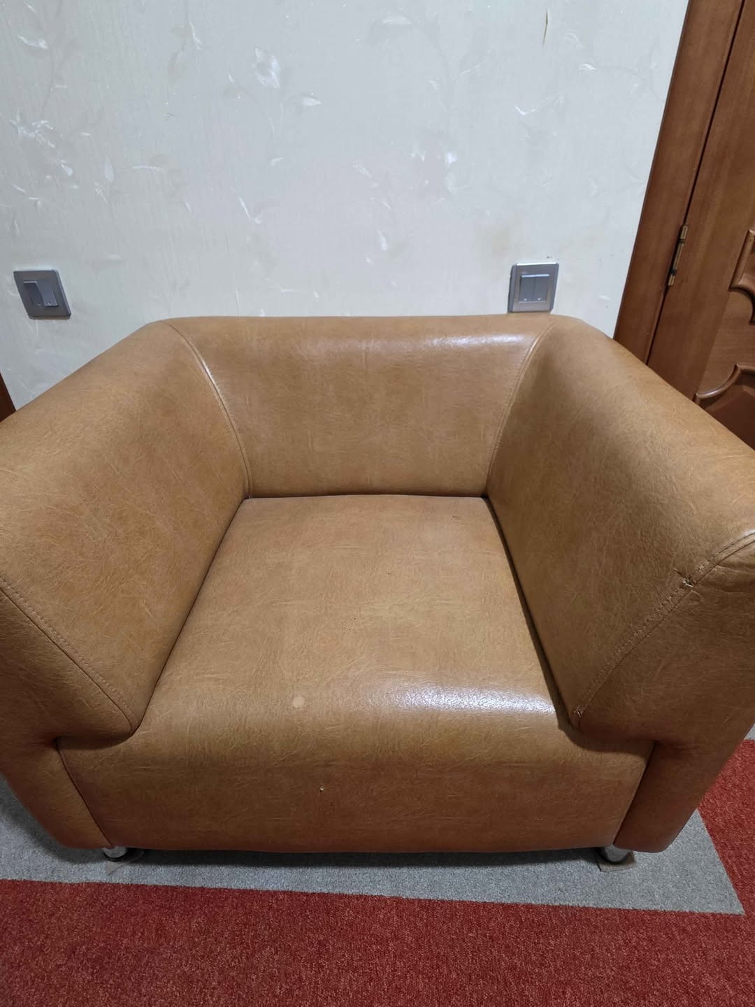 Brown leather armchair, good condition