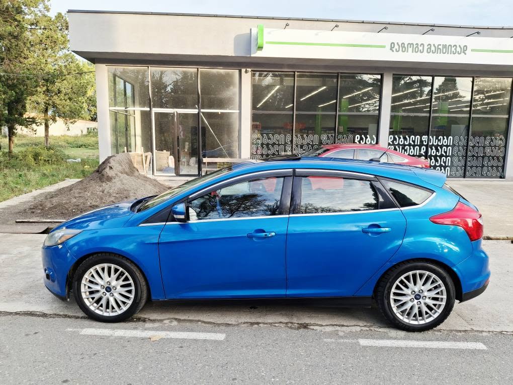 Kutaisidədir...4300 dollar....tam titanium 2014-cü il...2.0 avtomat…