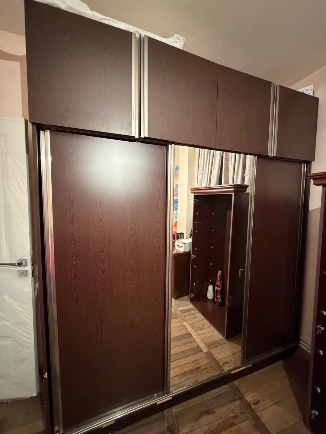 Cabinet with sliding doors, disassembled condition