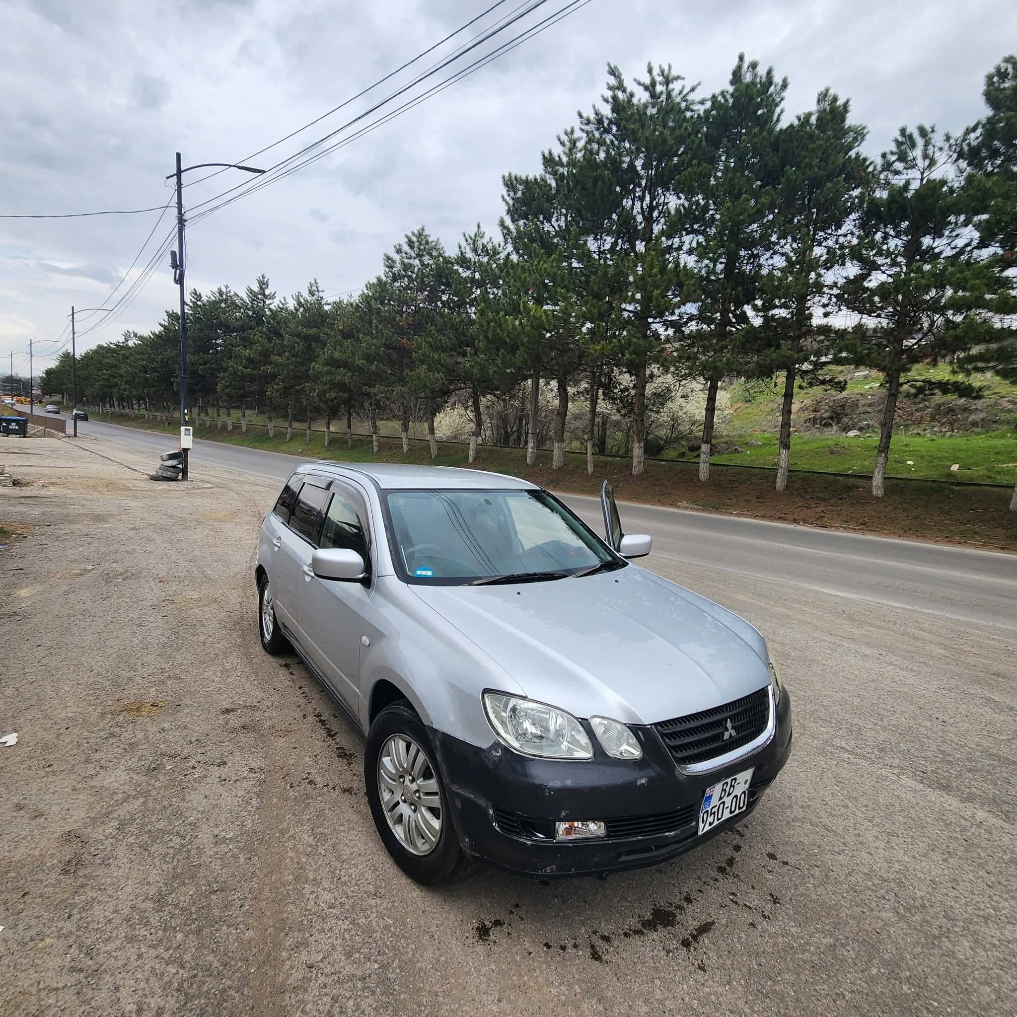 Silver Mitsubishi wagon, exchange or sale