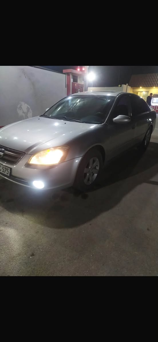 Silver sedan, urgent sale