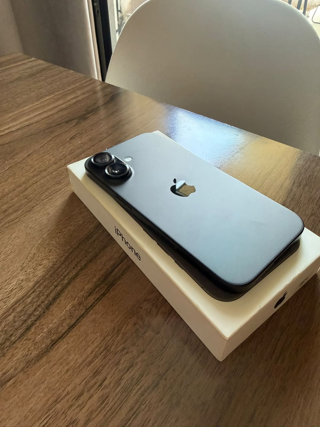 iPhone 16 with eSIM, 89% battery, and box included