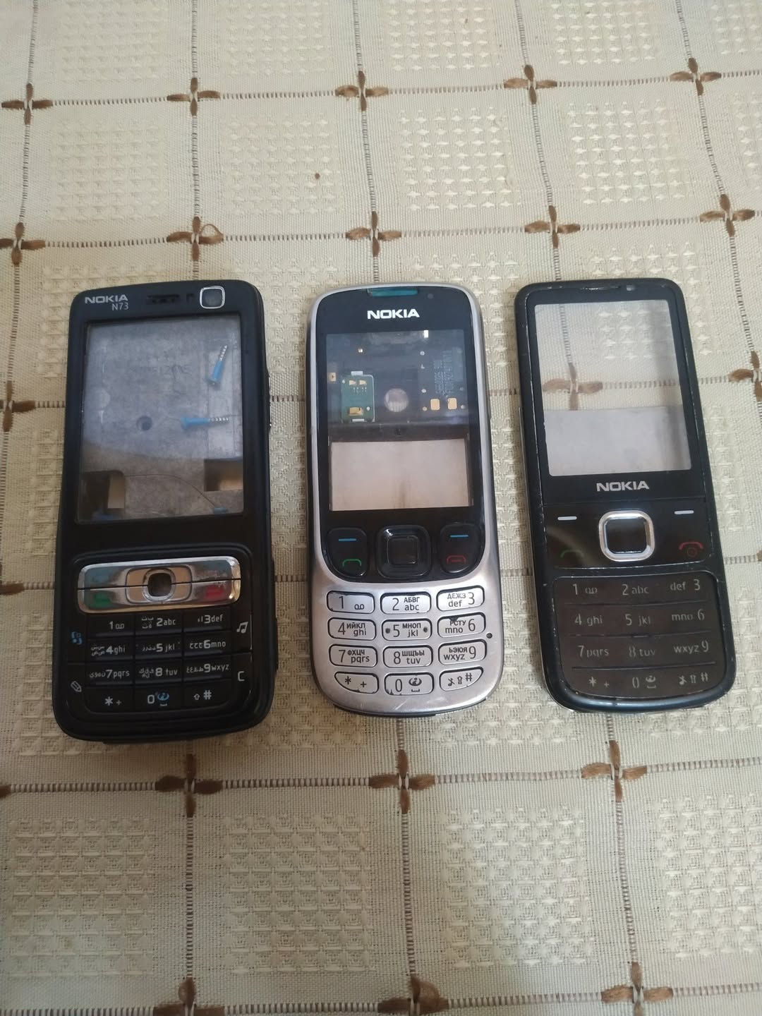 Three Nokia phone casings