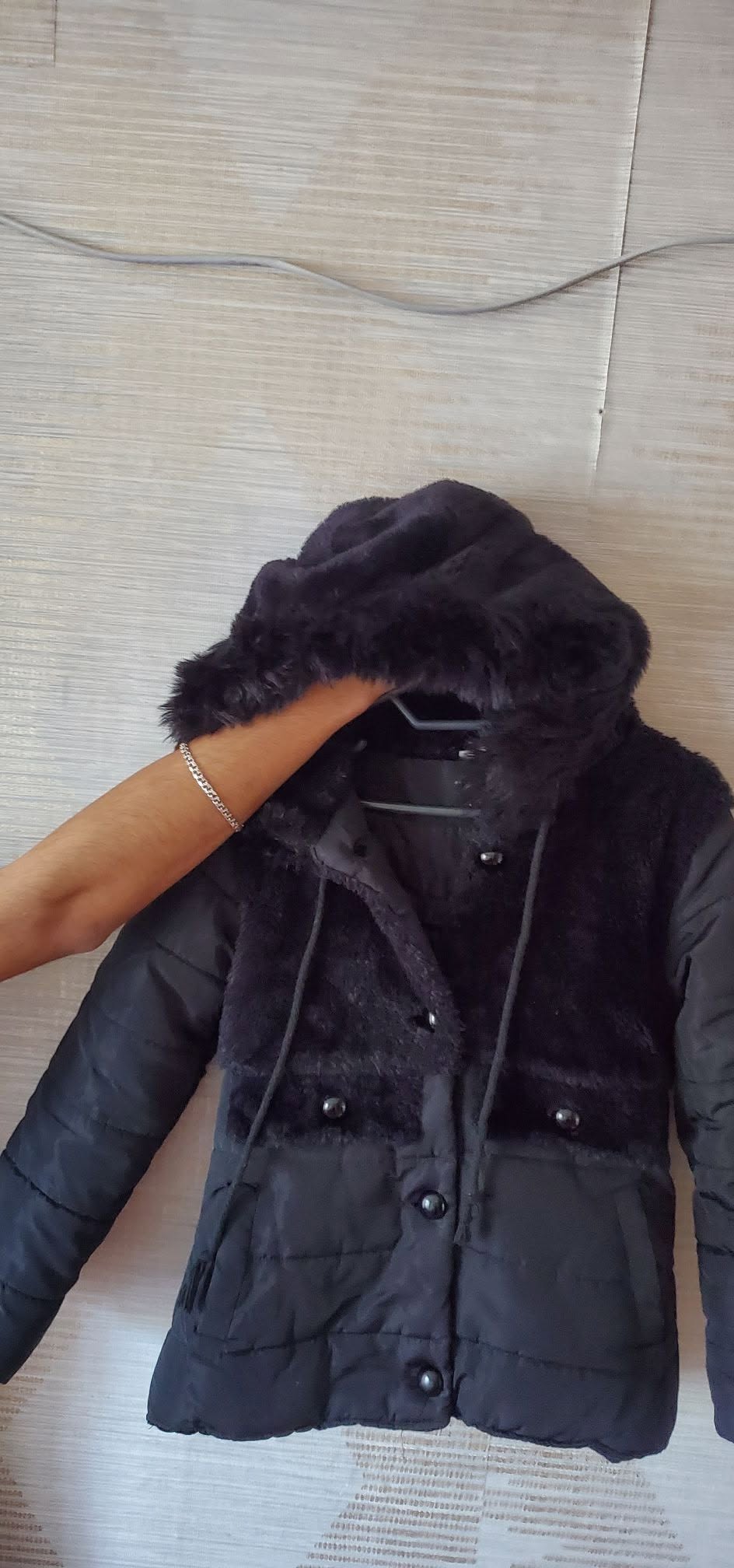 Black winter kurk with a hat