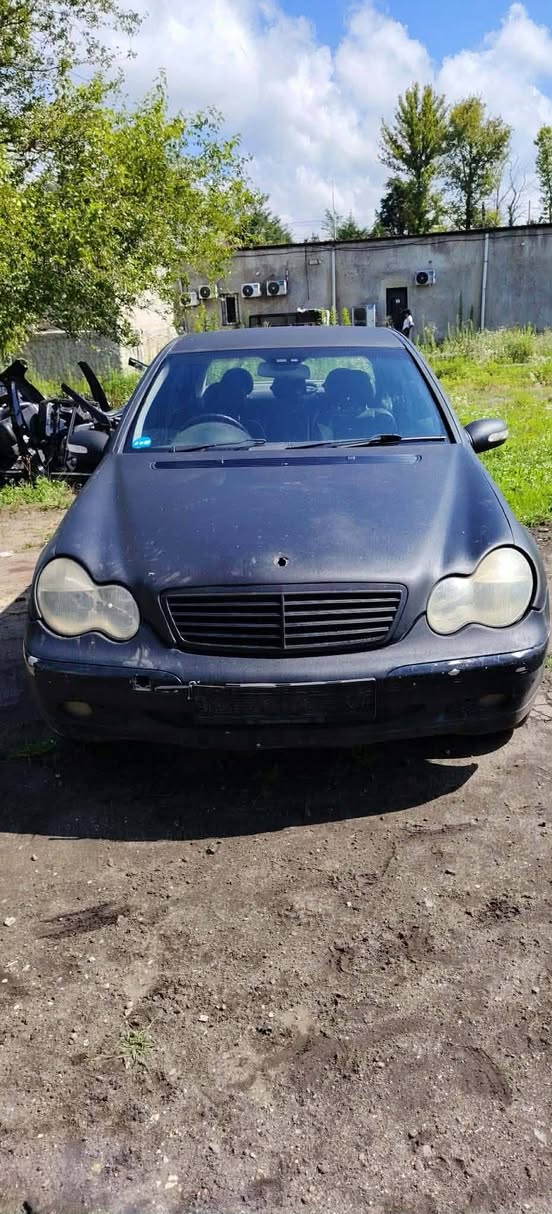 W203