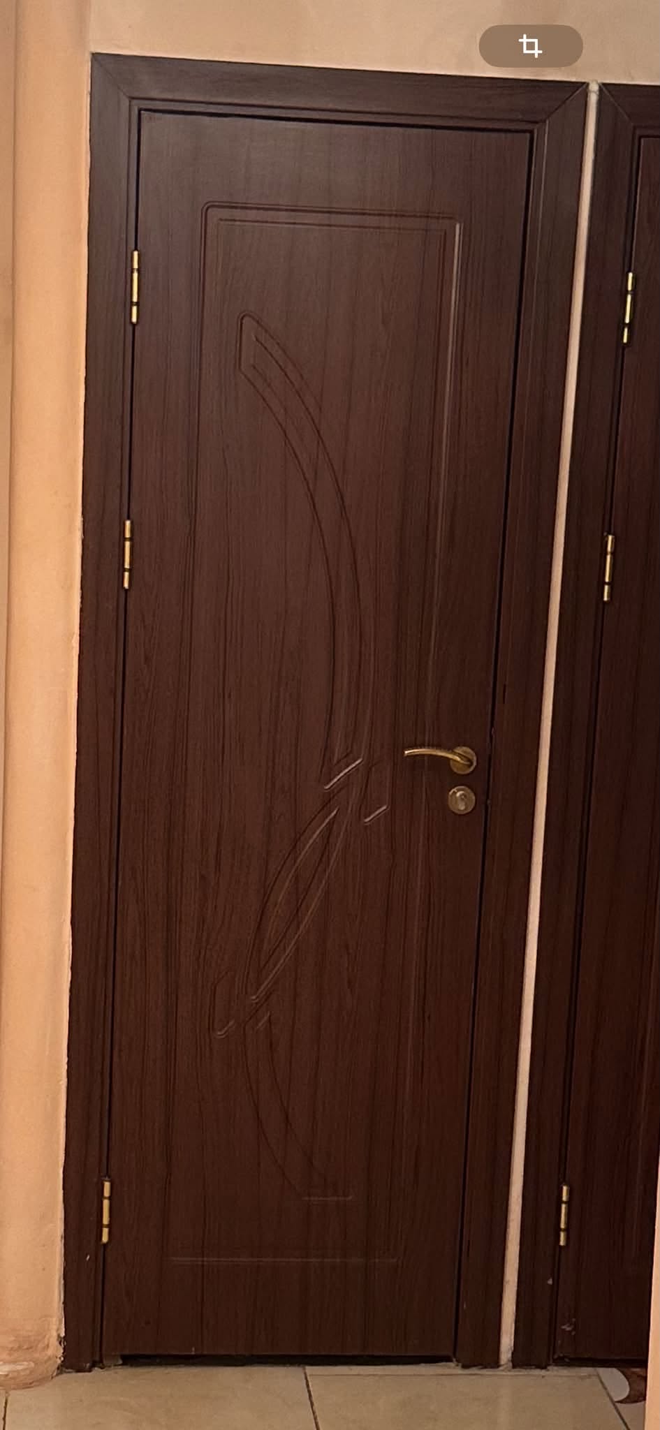 Dark brown wooden interior door