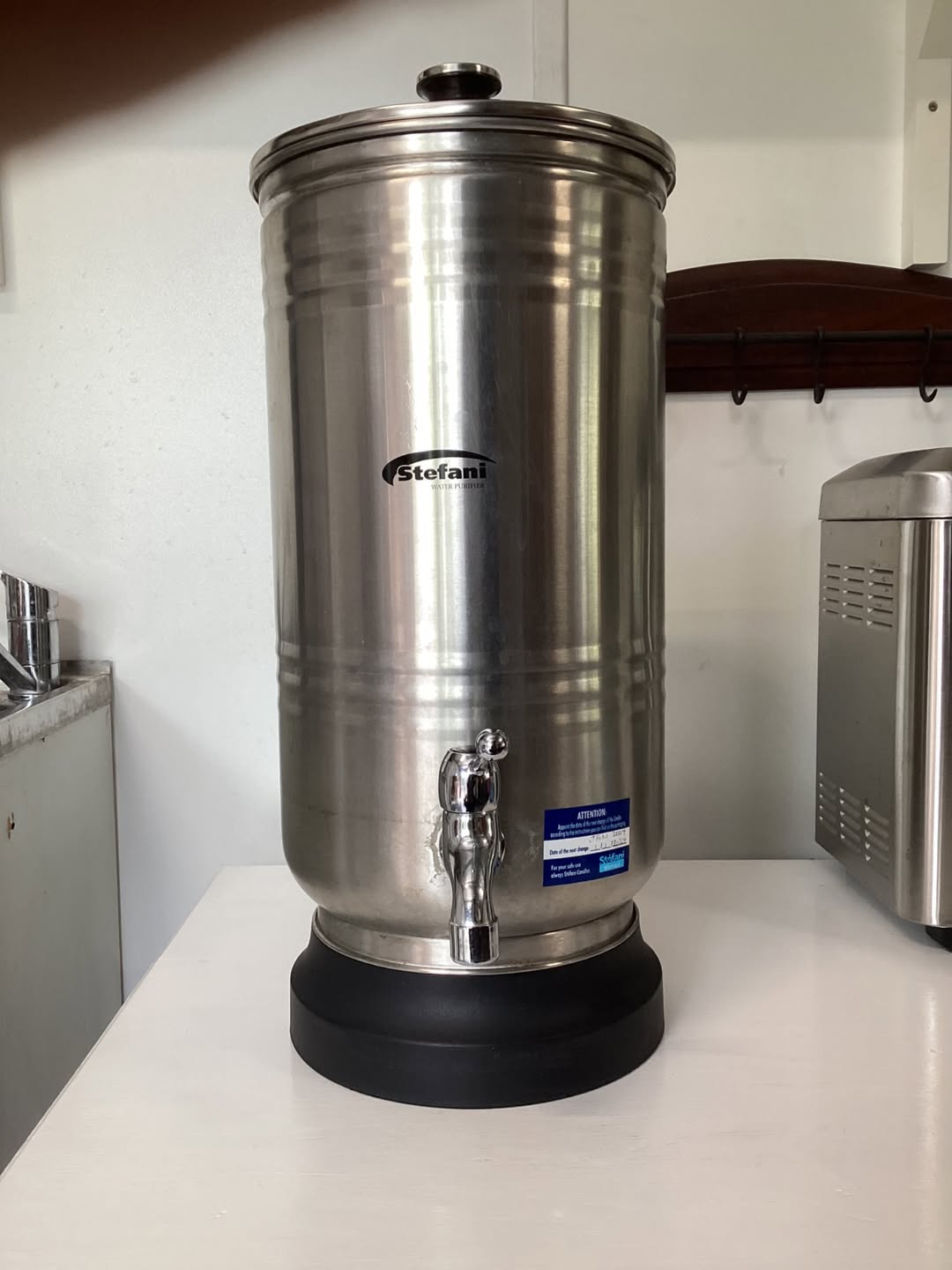 A Stefani Water filter and stand