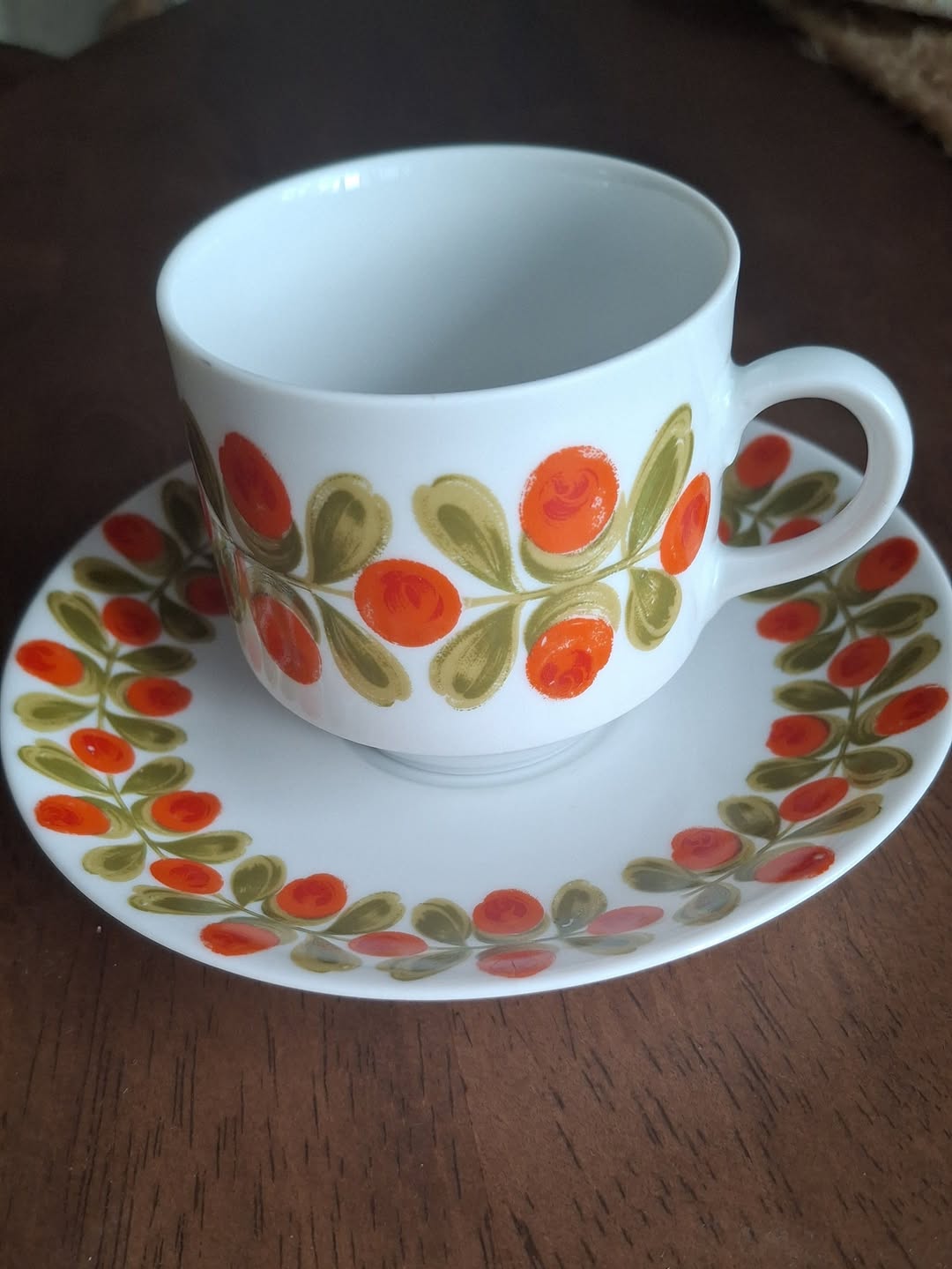 Porcelain cup and saucer, orange pattern