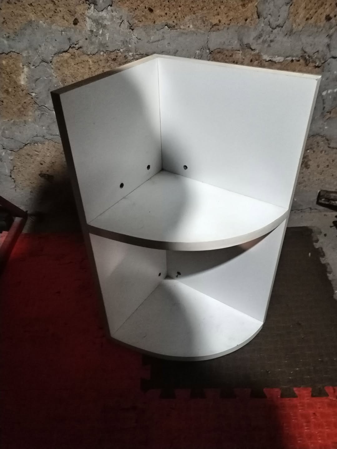 White corner shelf unit, two levels