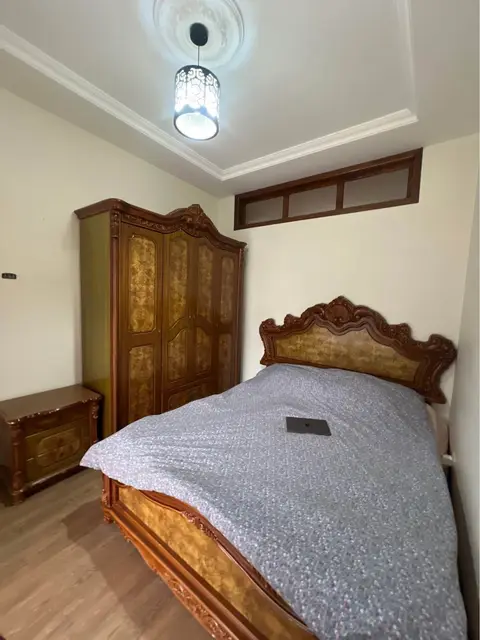 Classic bedroom set with bed and wardrobe