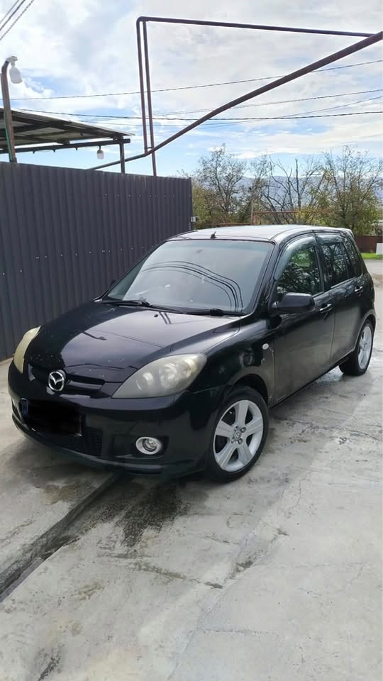 Tiptronik Demio 2006 — 2,000$