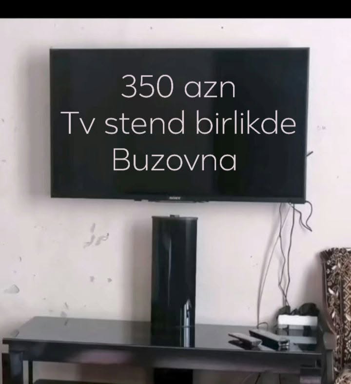 Sony TV with black glass TV stand