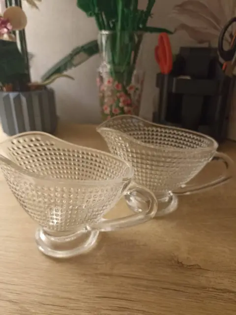 Pair of pressed glass sauce boats