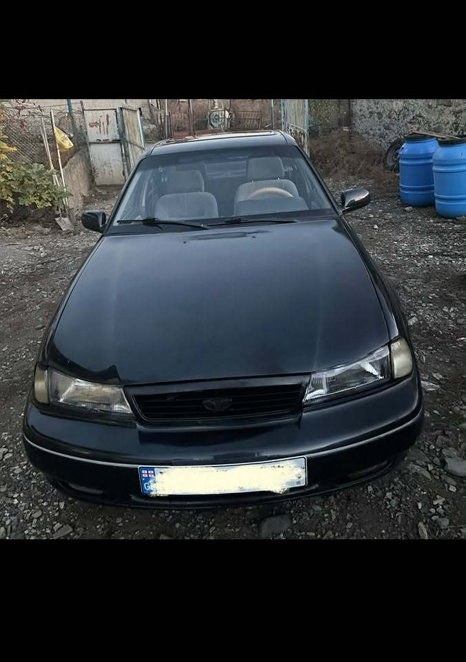 Black sedan car, Georgian plates