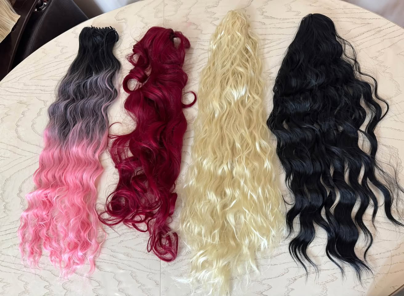 Semi-natural wavy hair extensions