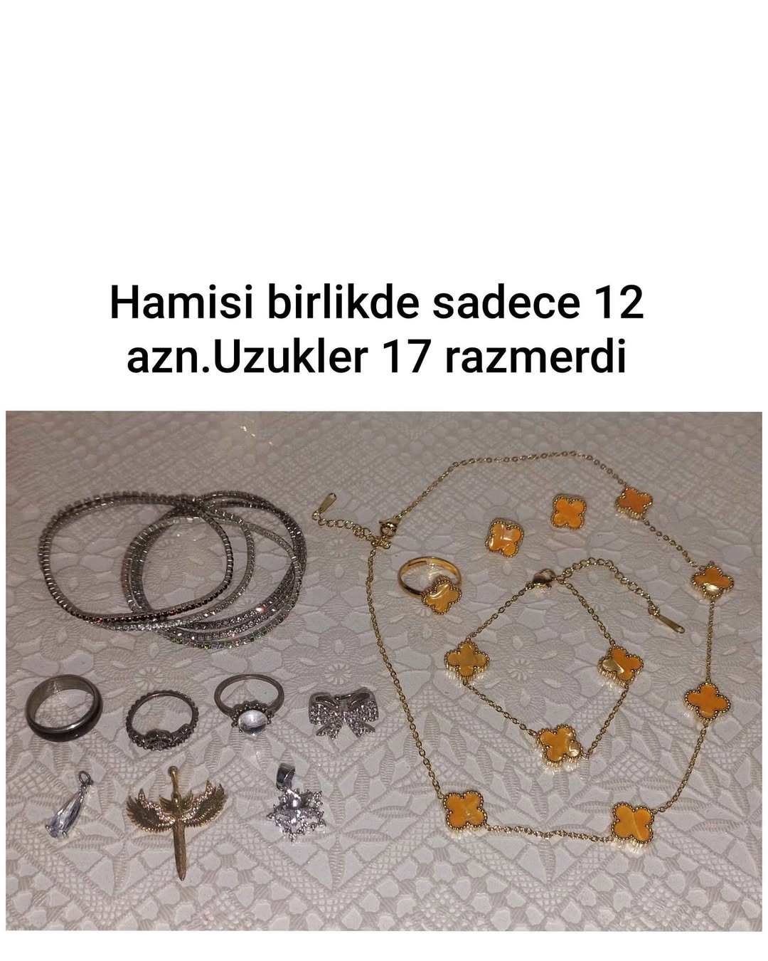 Mixed jewelry lot: rings, bangles, pendants