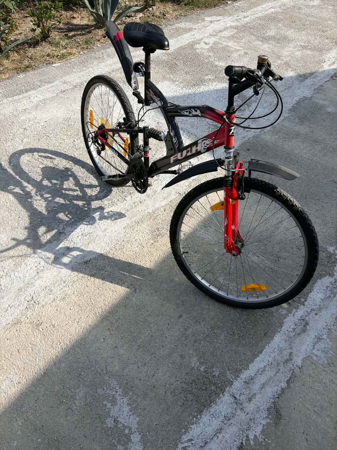 26-inch bicycle, red and black frame