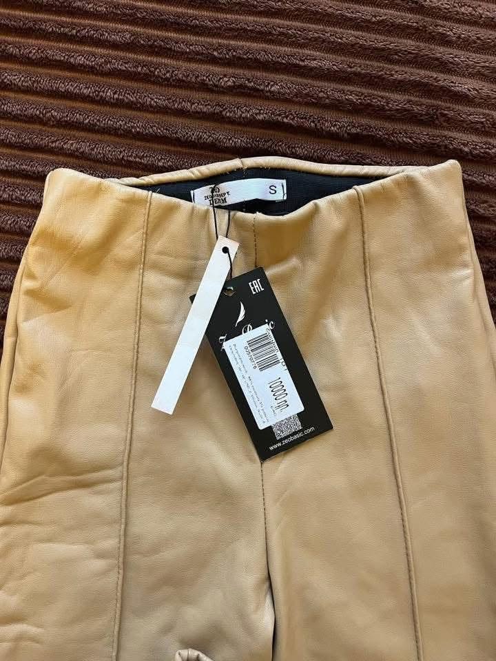 New beige faux-leather trousers, size 38