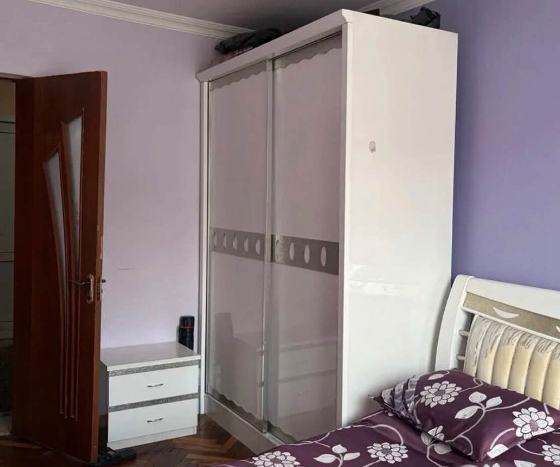 White sliding-door wardrobe