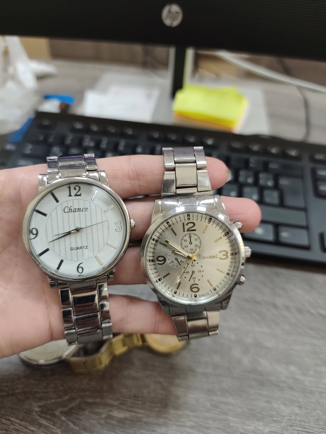 Two silver metal wristwatches, quartz