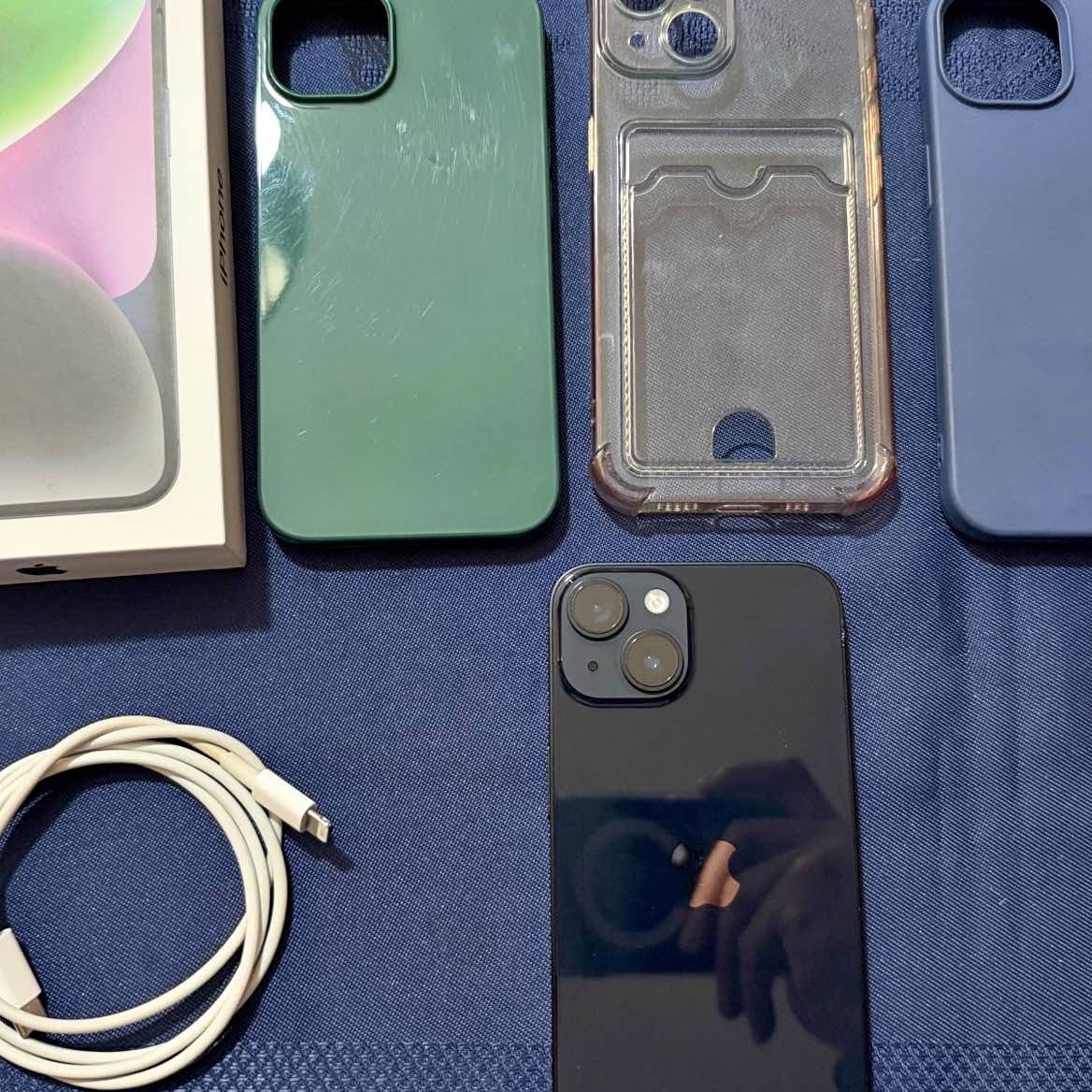 iPhone with box, cable and cases