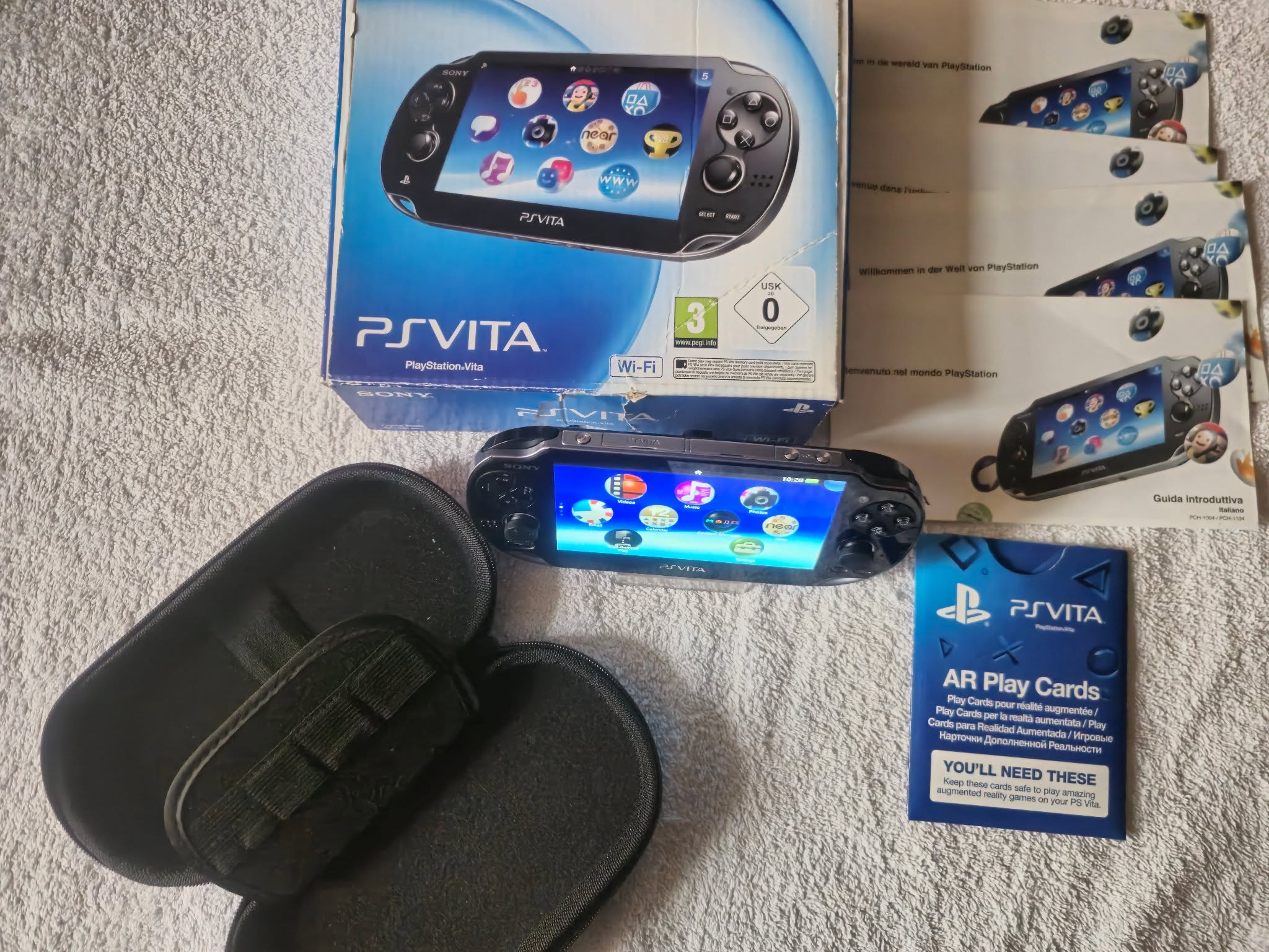 PS Vita 1004 with case and 64GB card