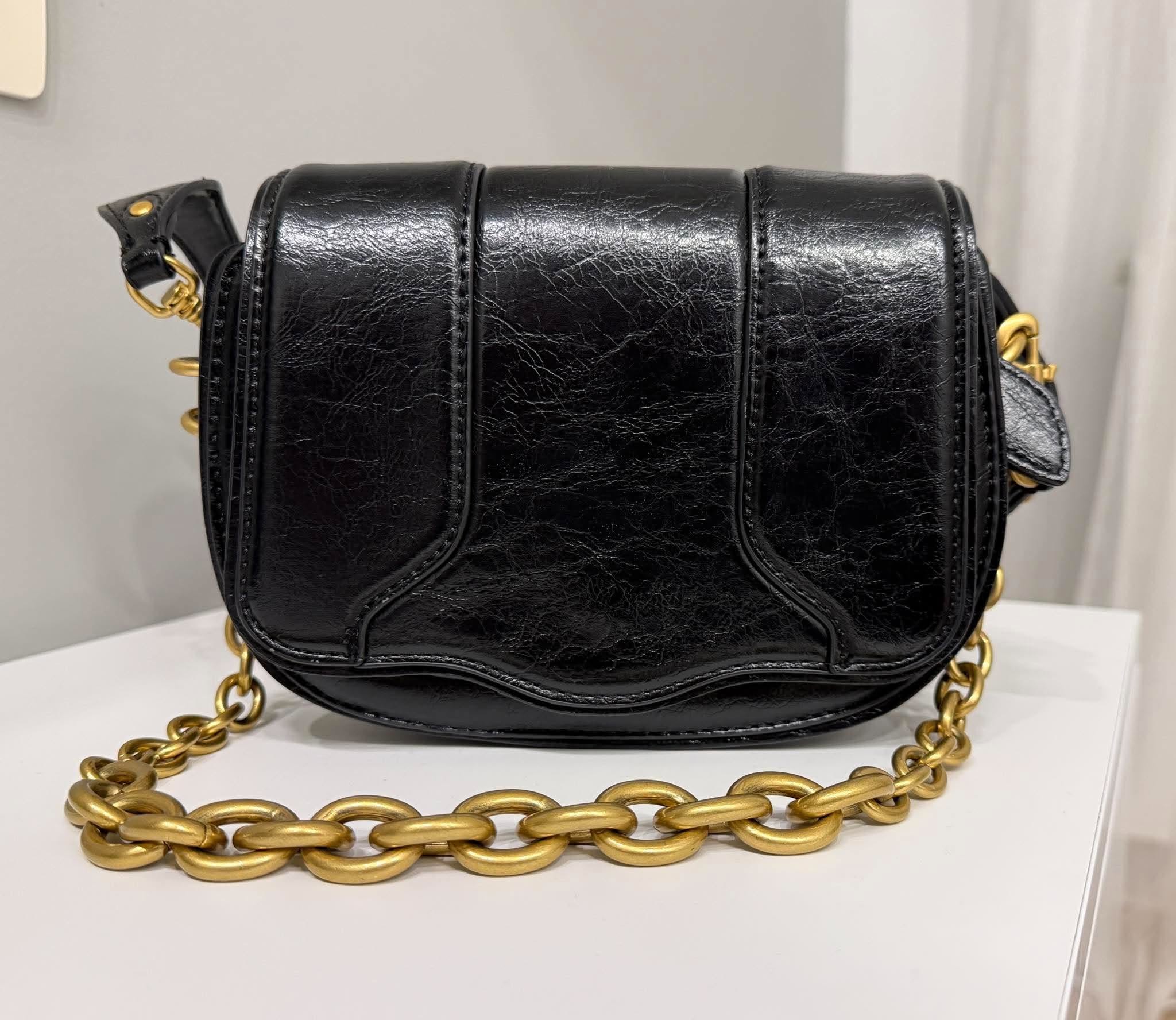 The **ZARA** bag is completely new, it has
