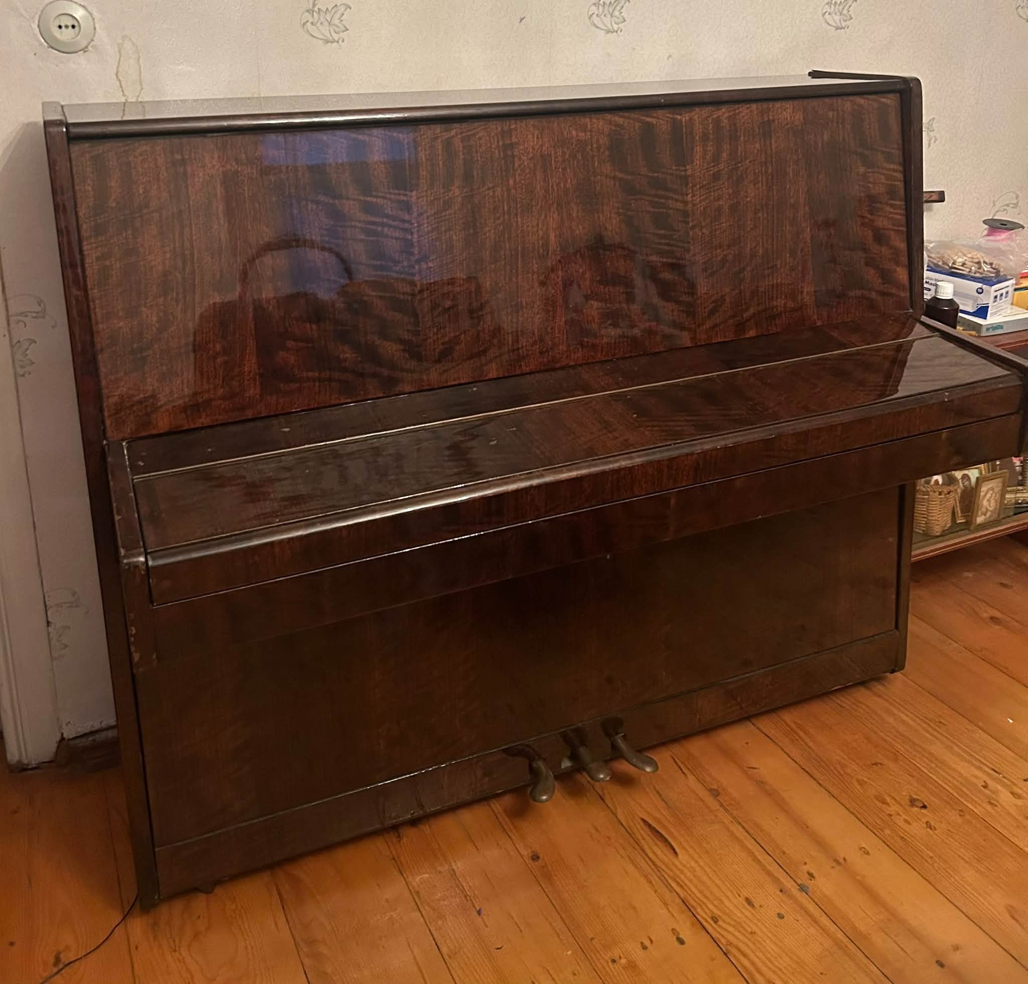 Upright piano, wood finish, from private home