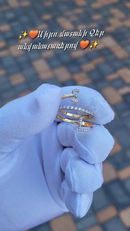 Gold-tone rings with white stones